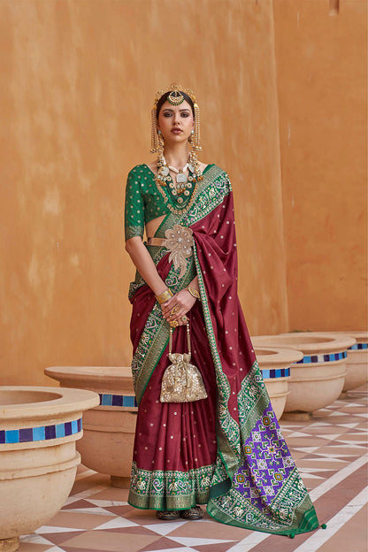 Brunette with Green Banarasi Patola With Contrast Ekat Border and Pallu