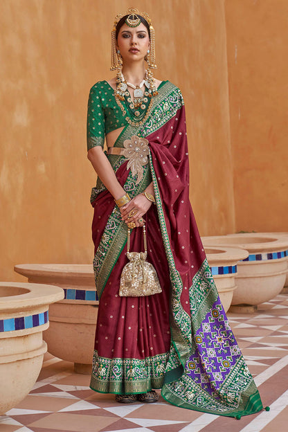 Brunette with Green Banarasi Patola With Contrast Ekat Border and Pallu