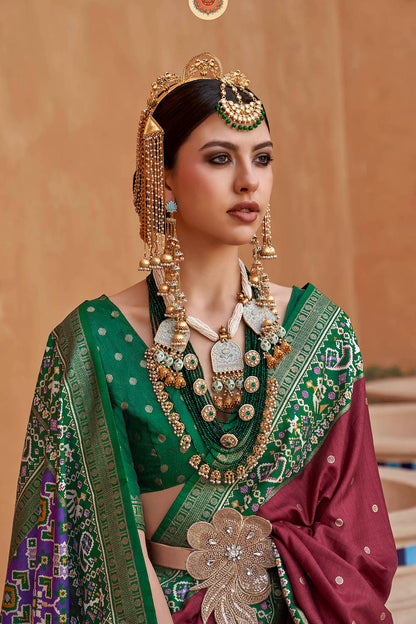 Brunette with Green Banarasi Patola With Contrast Ekat Border and Pallu