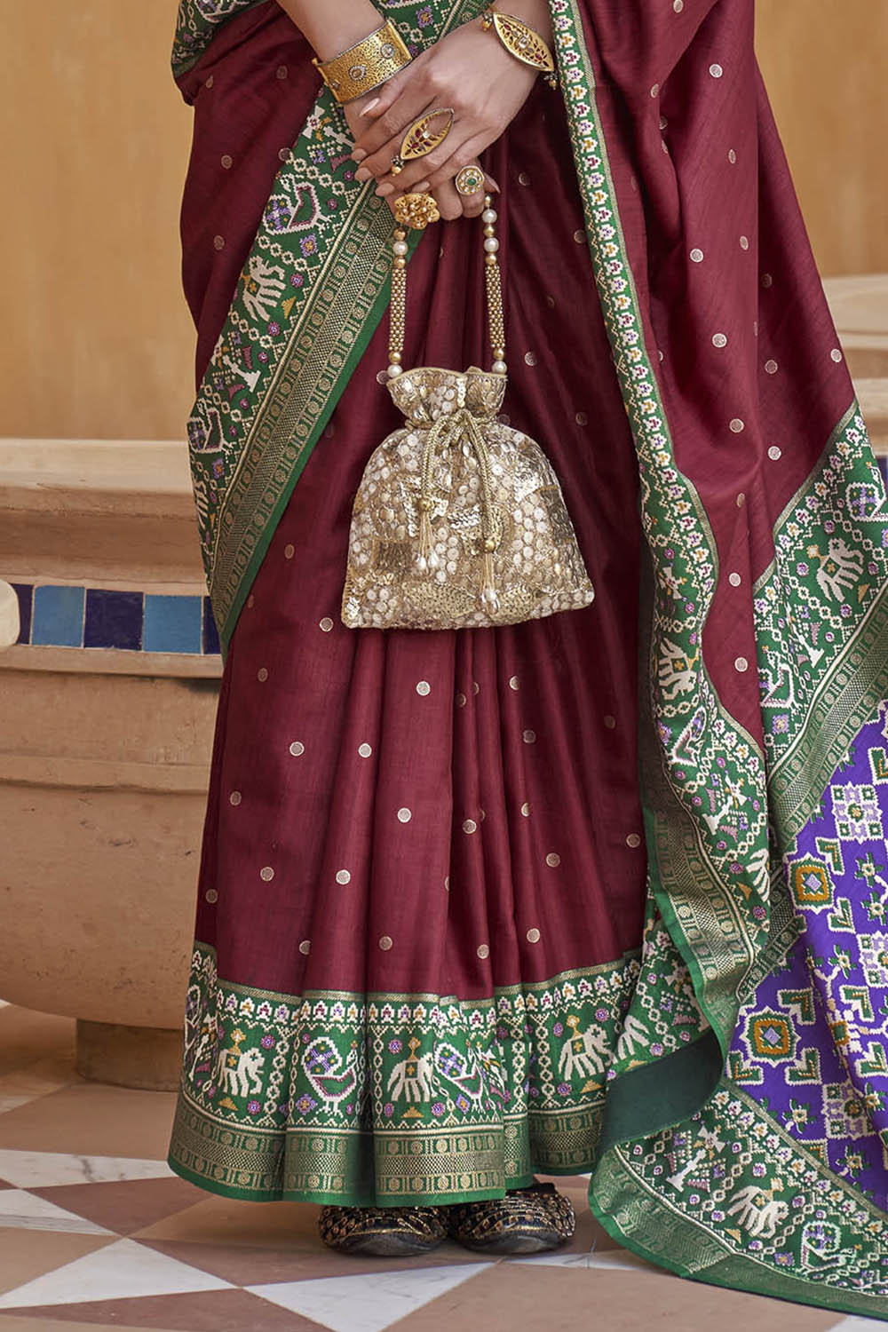 Brunette with Green Banarasi Patola With Contrast Ekat Border and Pallu