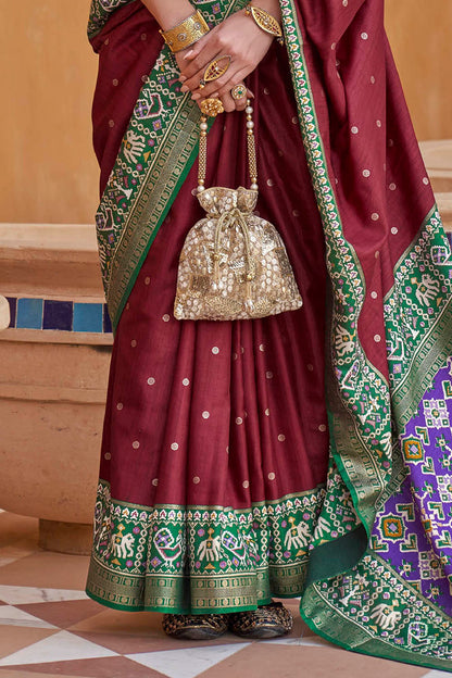 Brunette with Green Banarasi Patola With Contrast Ekat Border and Pallu