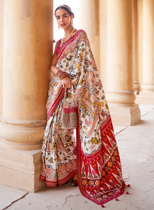 White Exclusive Ikkat Designer Patola Silk Saree with Tessles