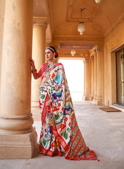 White with Red Navratna Patola Style Saree with Tessles