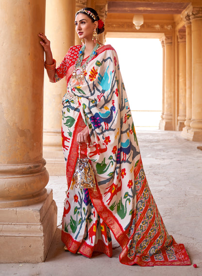 White with Red Navratna Patola Style Saree with Tessles