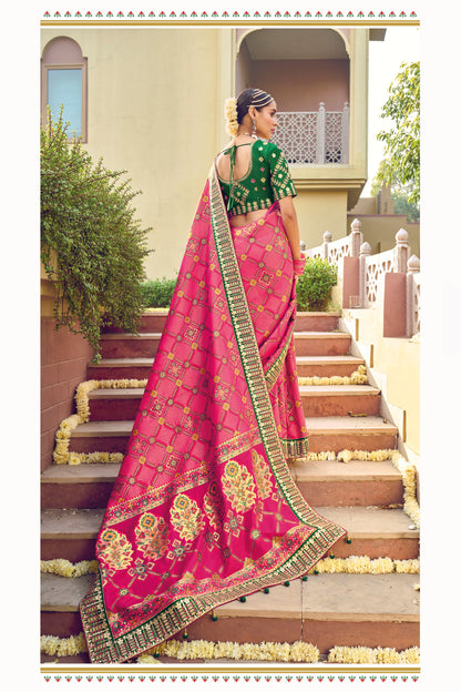 Soft Pink Patola Style Designer Dola Silk Saree with Green Blouse