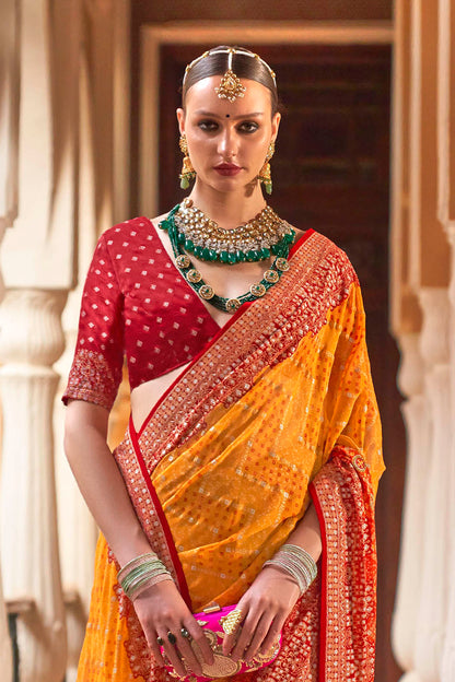 Persimmon Orange Leheriya Style Soft Georgette Saree with Heavy Embroidered Border