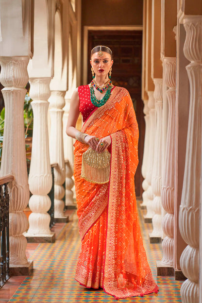 Fanta Orange Leheriya Style Soft Georgette Saree with Heavy Embroidered Border