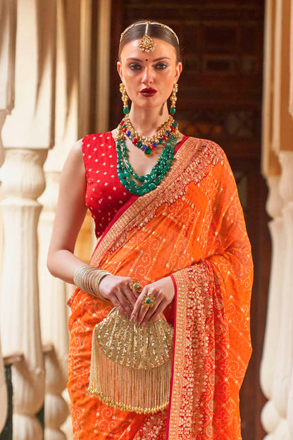 Fanta Orange Leheriya Style Soft Georgette Saree with Heavy Embroidered Border