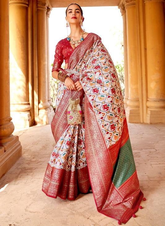 White with Red Navratna Patola Style Saree with Tessles