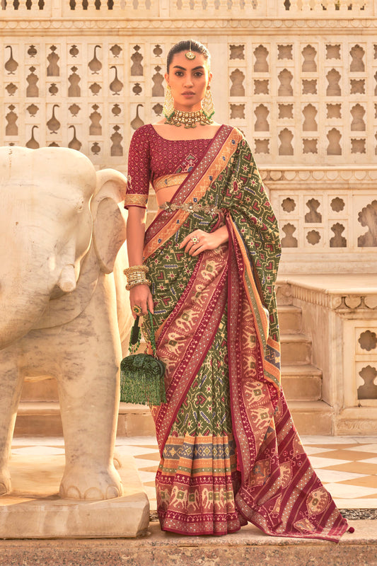 Pine Green Woven Patola Designer Saree with Elephant Border