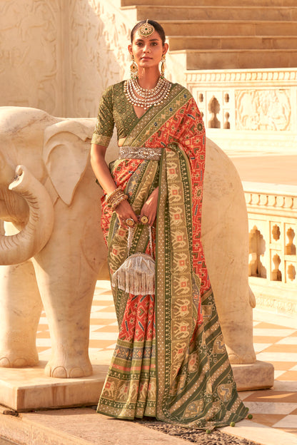 Coral Orange Woven Patola Designer Saree with Elephant Border