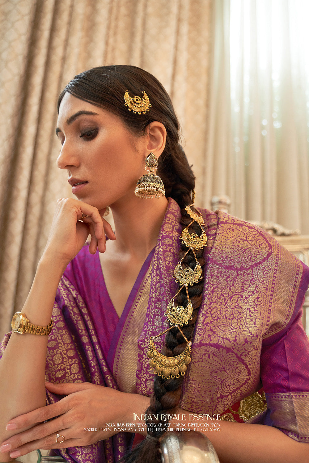 Wine Purple Woven Brocade Kanjivaram Saree with Peacock Border