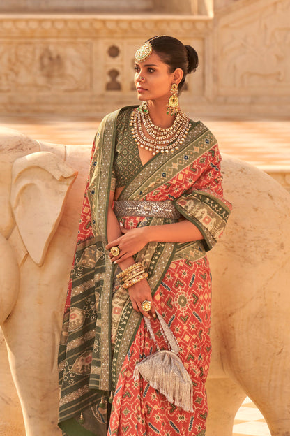 Coral Orange Woven Patola Designer Saree with Elephant Border