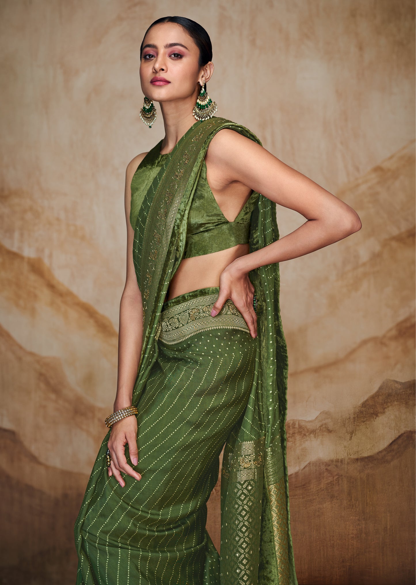 Green Bandhani Saree with Hand Embroidered Border and Velvet Blouse