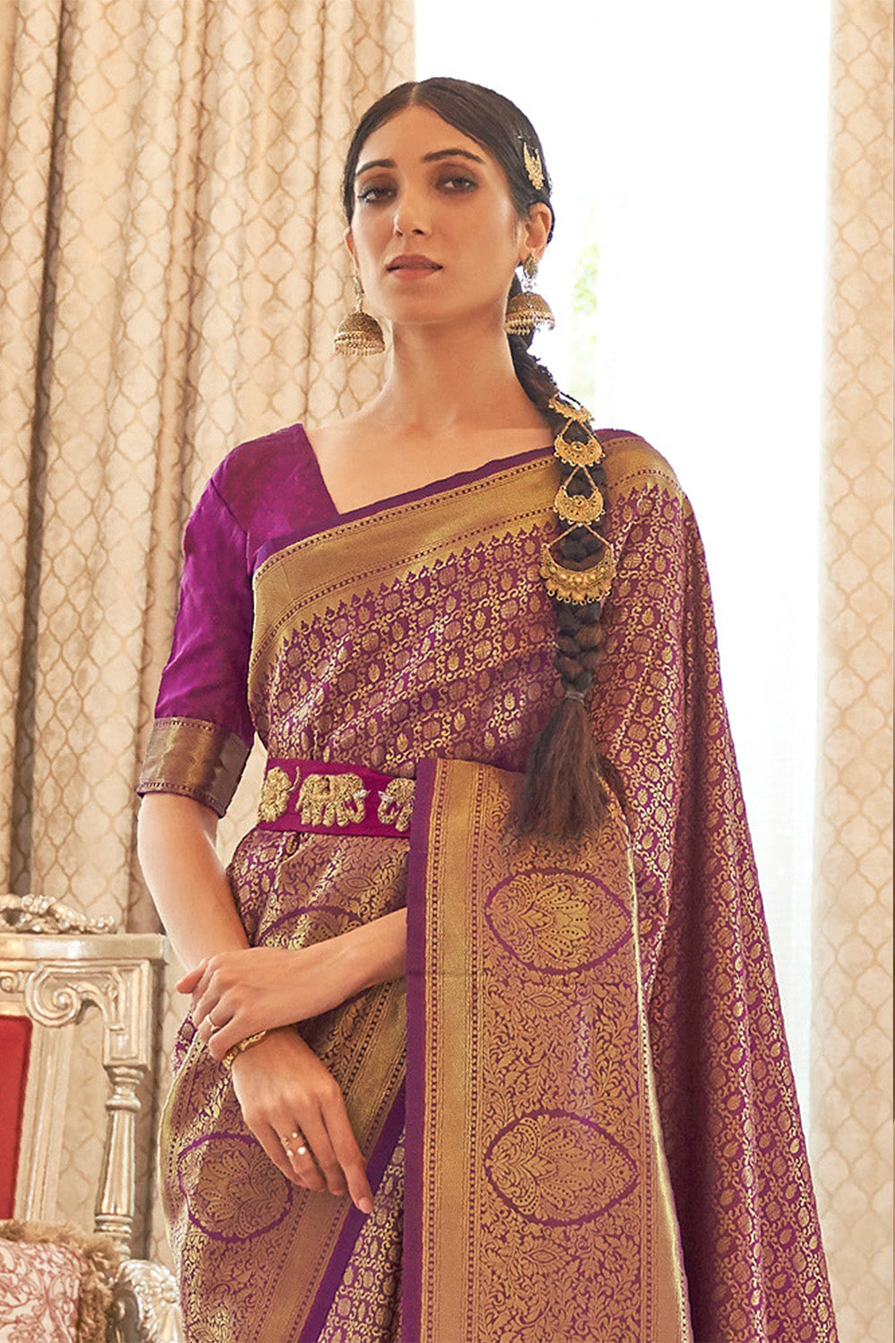 Wine Purple Woven Brocade Kanjivaram Saree with Peacock Border