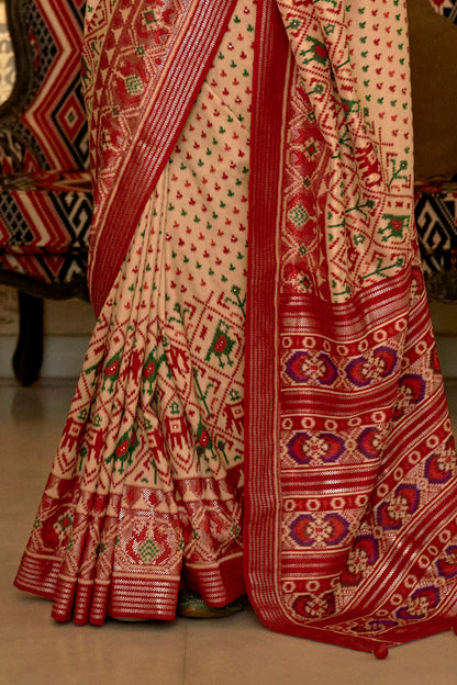 Cream with Red Ikat Design Patola Saree with Patola Border and Blouse