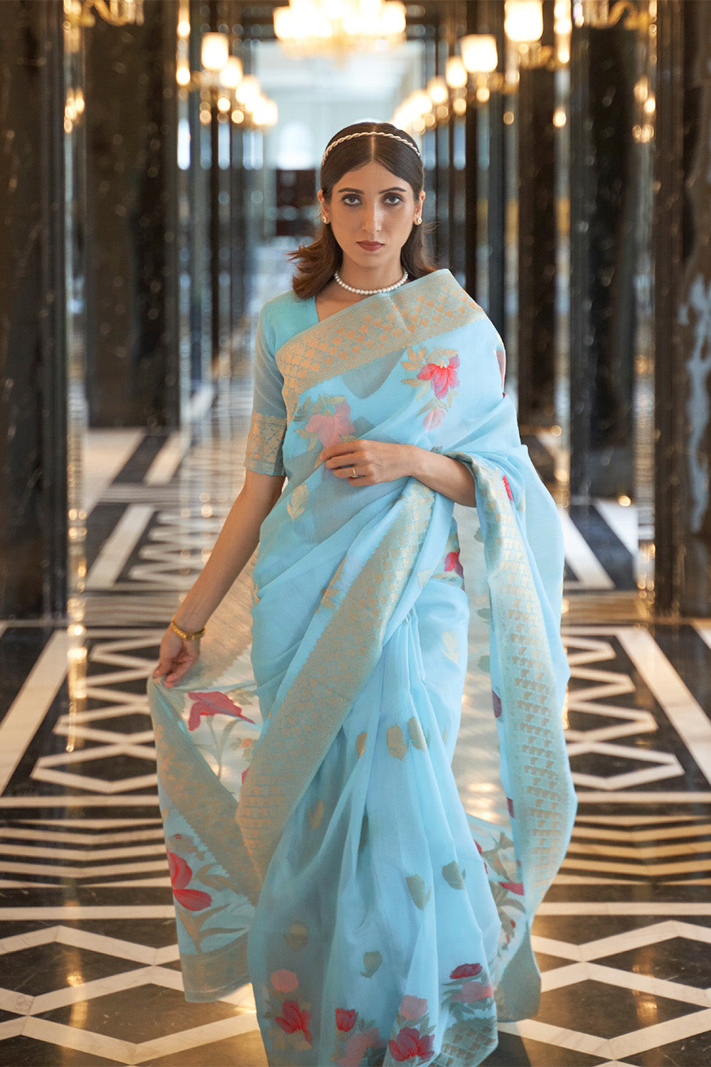 Baby Blue  Zari Woven Floral Pallu Linen Saree.