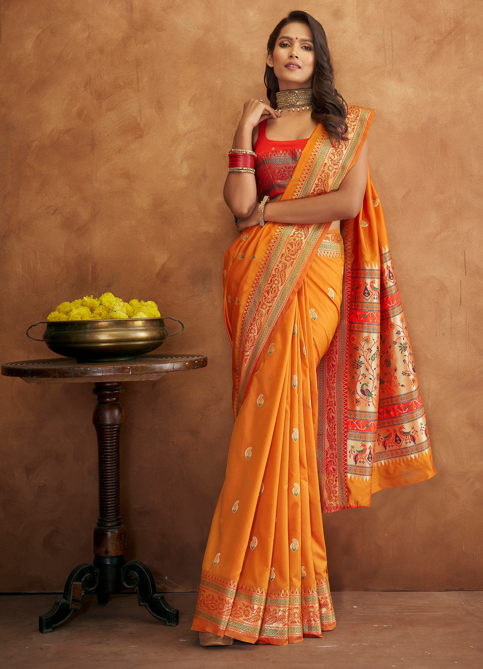 Nalli - Adorn a graceful allure as you drape this beautiful mango yellow  Kanchipuram silk saree woven with zari bhuttas and rich red zari border.  Shop Now at https://bit.ly/mangoyellowkanchipuramsilk70265 #Nalli  #nallisilk #saree #