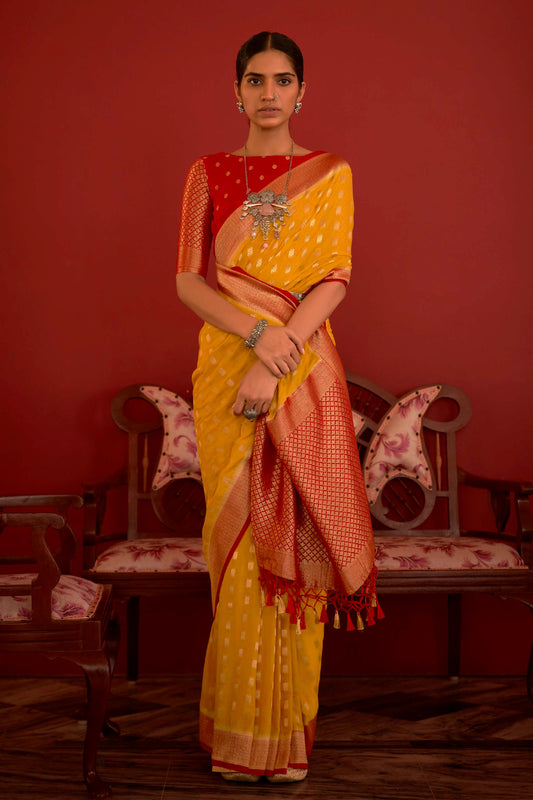 Mango Yellow Soft Kanjivaram Saree with Red Kanchi Pattu Border