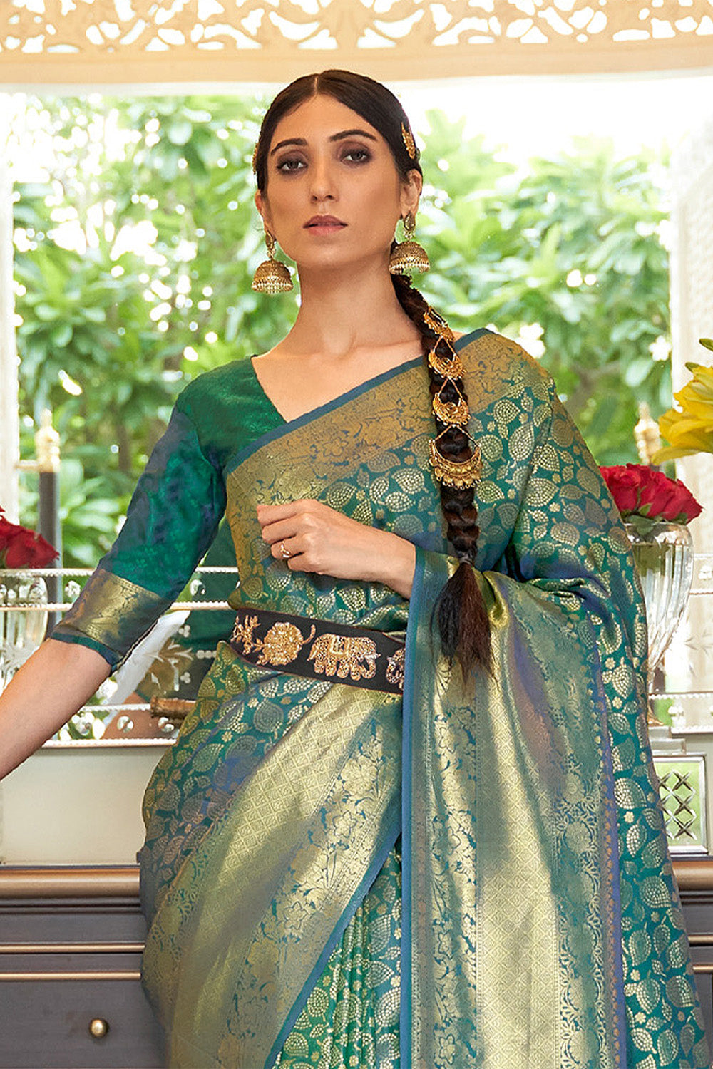 Dark Green Woven Brocade Kanjivaram Saree with Peacock Border