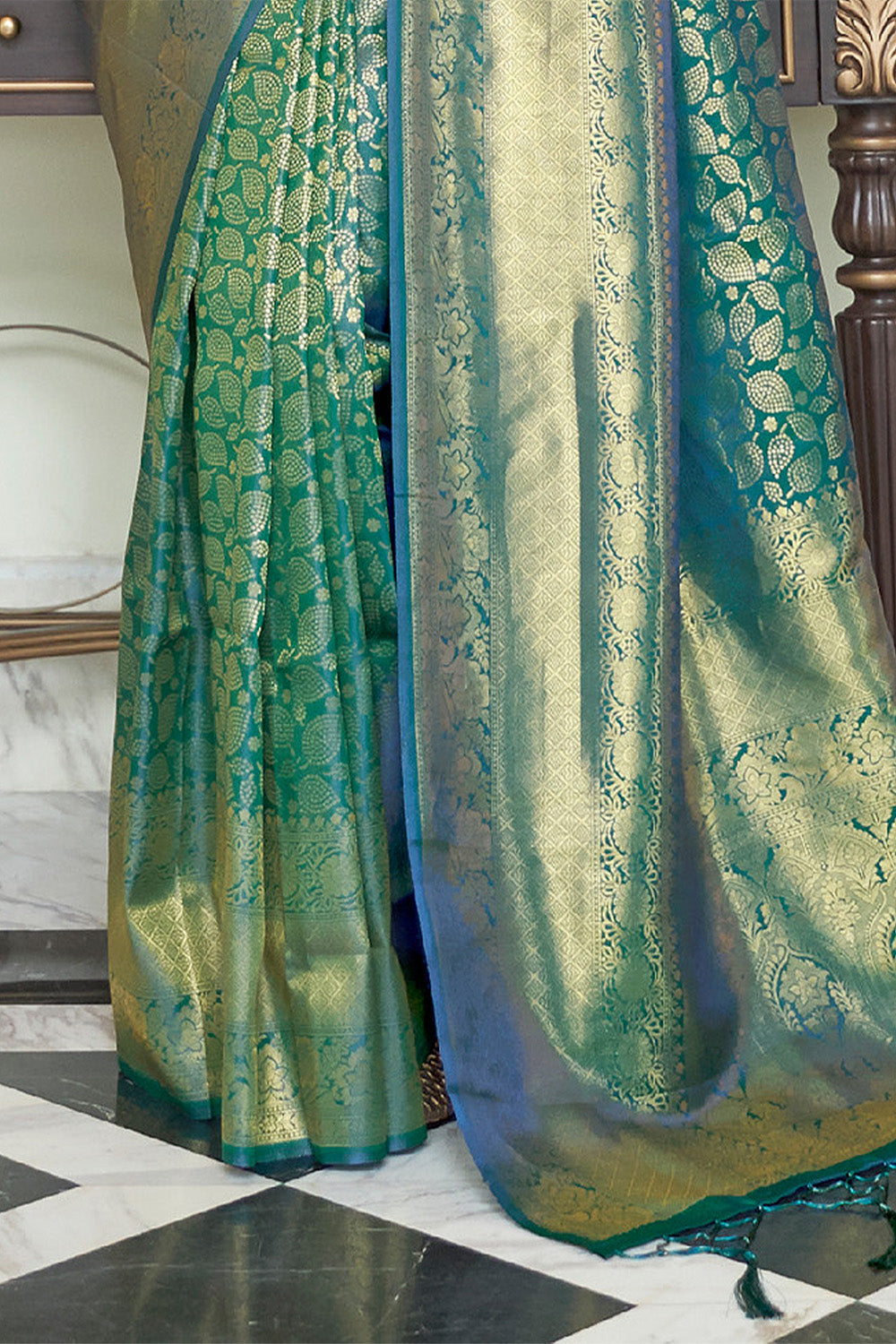 Dark Green Woven Brocade Kanjivaram Saree with Peacock Border