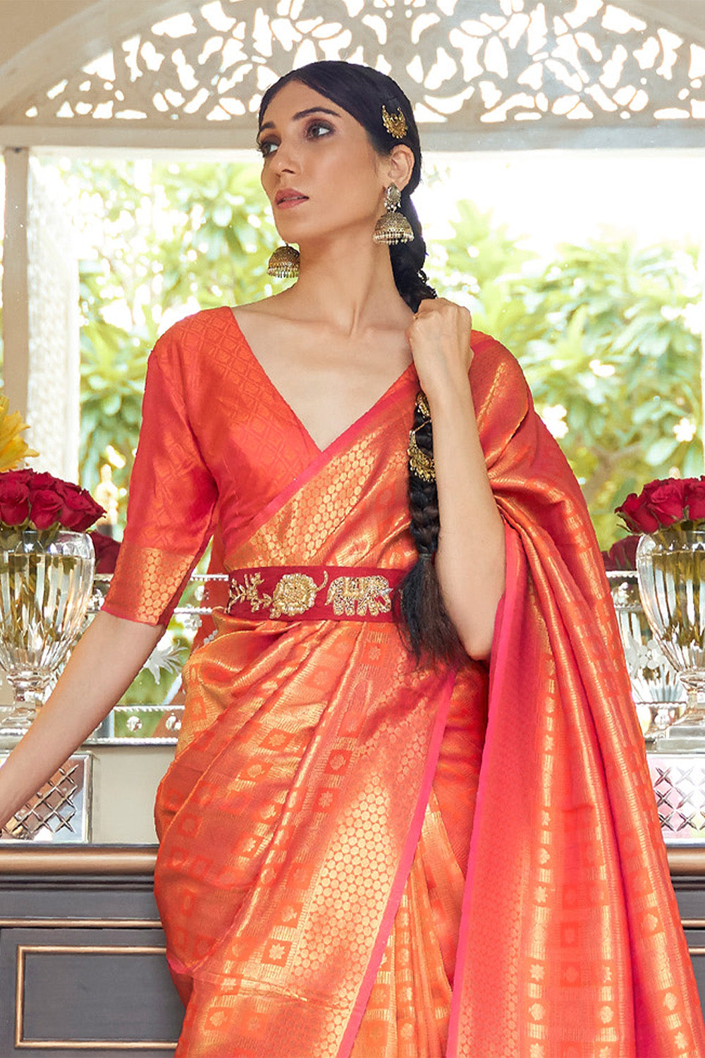 Bright Orange Woven Brocade Kanjivaram Saree with Peacock Border