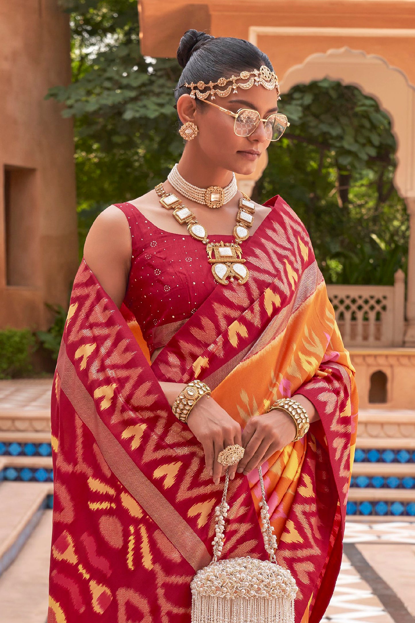 Ocher Ikat Patola Design Saree with Contrast Blouse